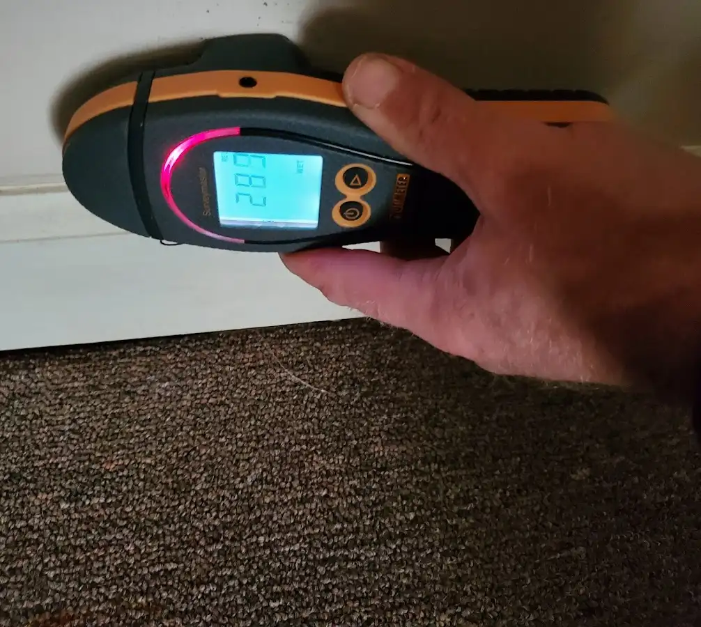 Moisture detection at baseboard during Burst Pipe Cleanup in Tulsa